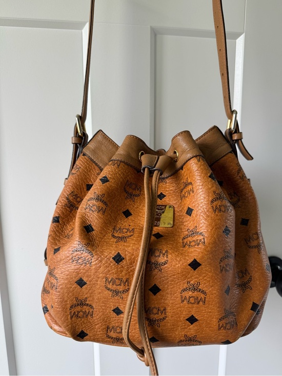 MCM Handbags - MCM Cognac Visetos Logo Drawstring Shoulder Bag
